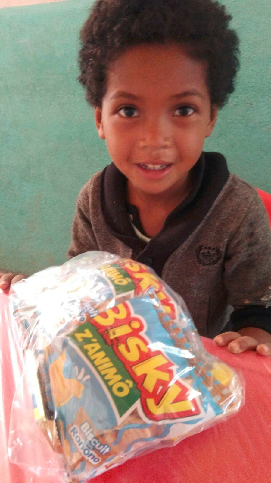 Photo 40 — enfants et équipe de Kilonga Tafita sur le terrain